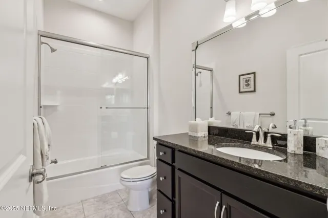 a view of a forest with trees