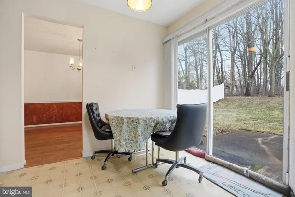 a workspace with furniture and a window