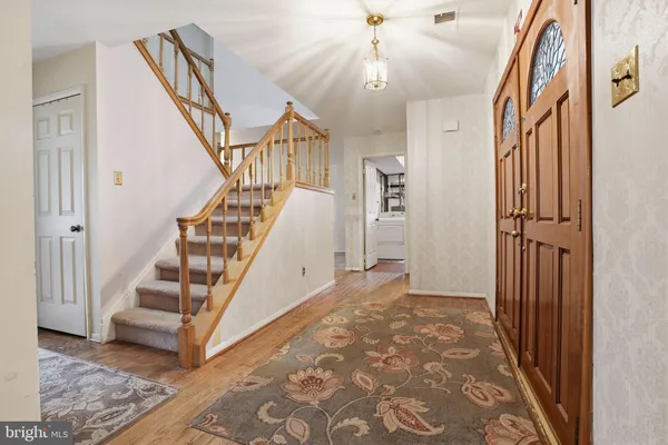 a view of an entryway with staircase