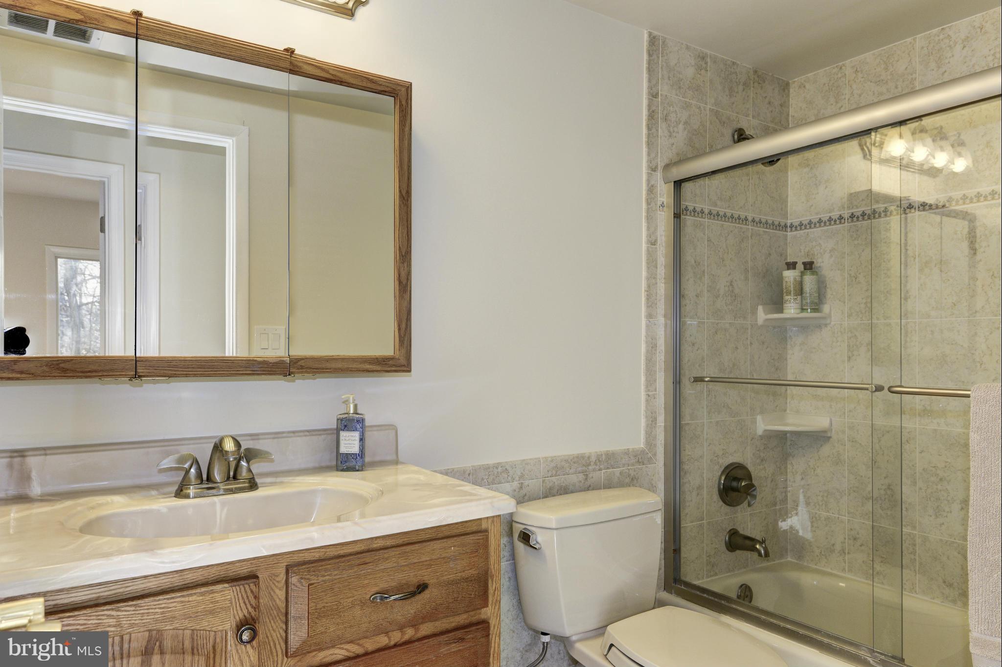 5911 Hall Street Springfield, VA 22152 - Photo 22 of 30 Renovated Upper Hall Full Bath wCeramic Tile