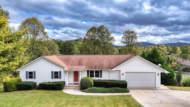 a house view with a garden space