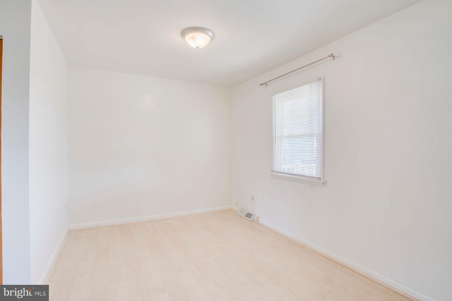 2011 Shore Road Dundalk, MD 21222 - Photo 27 of 37 an empty room with a window