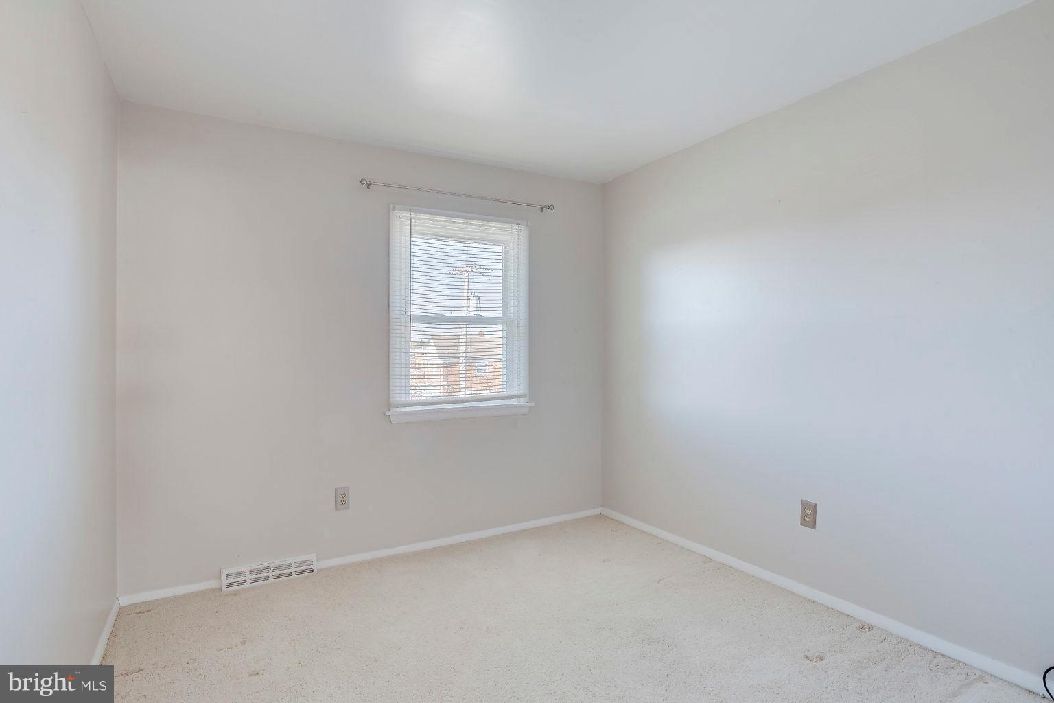 2011 Shore Road Dundalk, MD 21222 - Photo 35 of 37 an empty room with a window