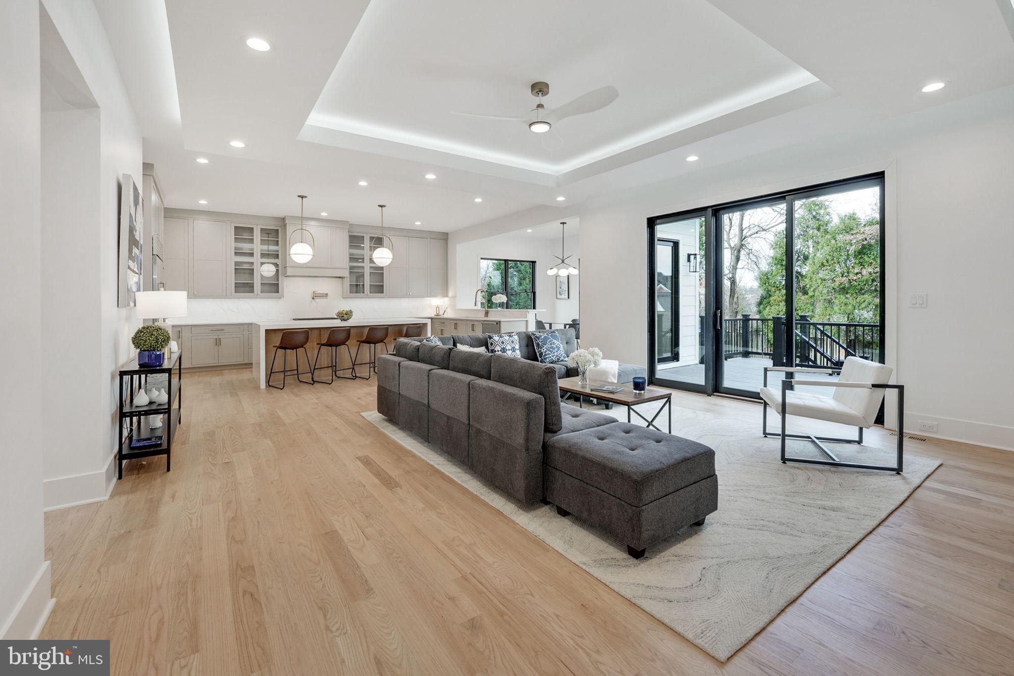 1422 Mayflower Drive McLean, VA 22101 - Photo 15 of 67 Family Room and Kitchen with view of rear yard