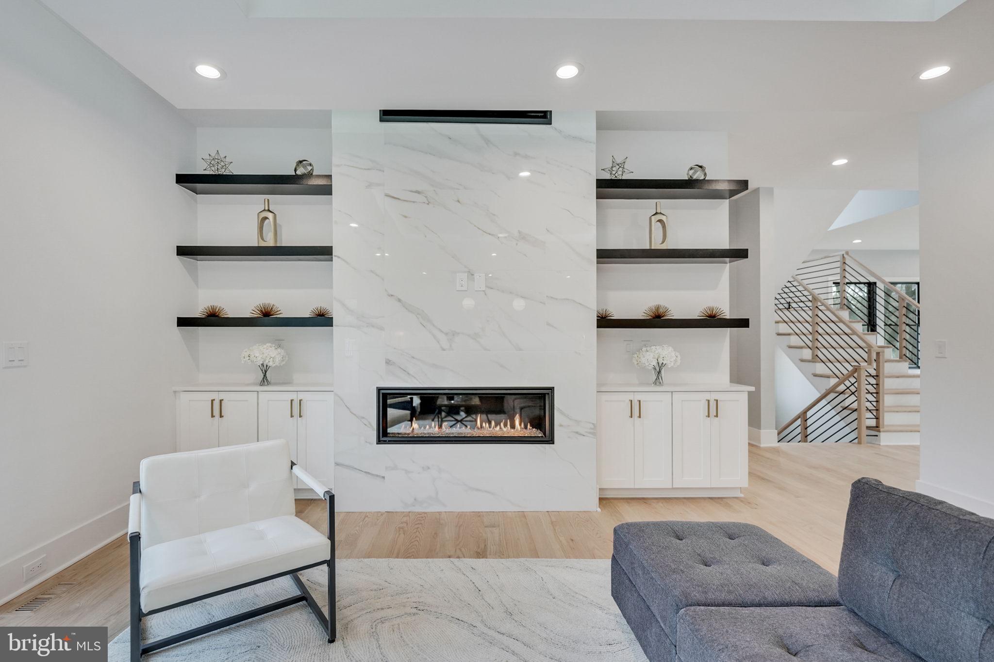 1422 Mayflower Drive McLean, VA 22101 - Photo 17 of 67 Family Room has a gas fireplace with custom surr