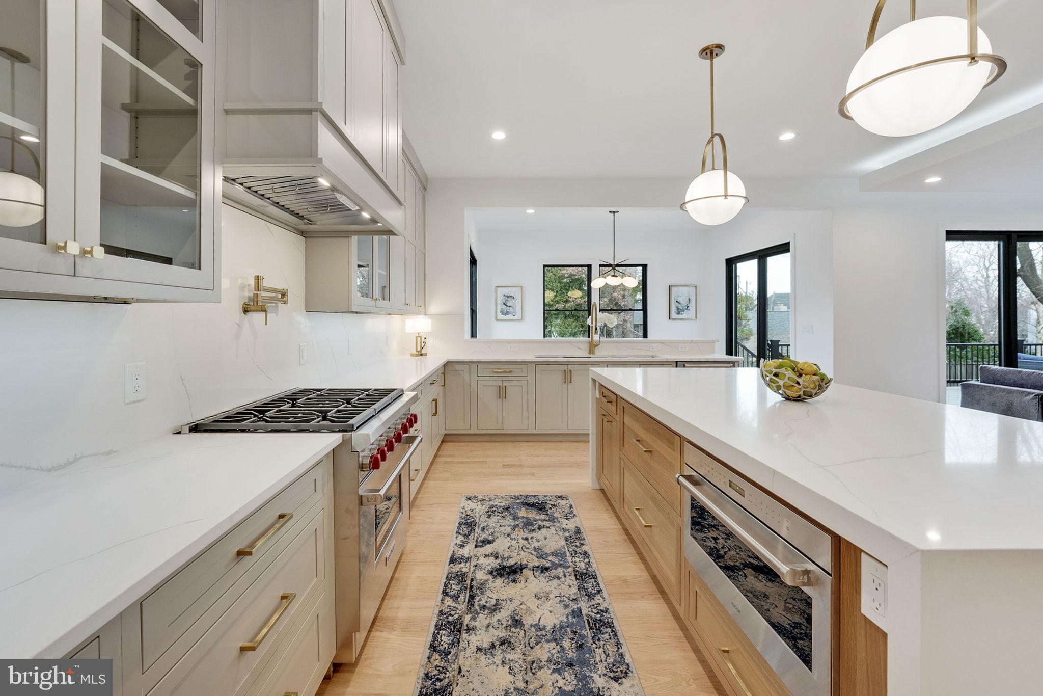1422 Mayflower Drive McLean, VA 22101 - Photo 22 of 67 Kitchen has putty colored cabinets on the wall