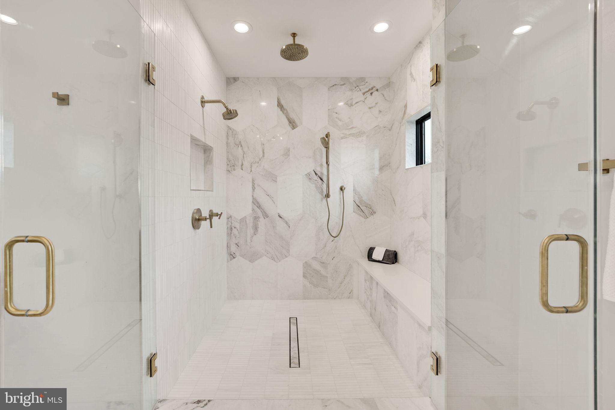1422 Mayflower Drive McLean, VA 22101 - Photo 34 of 67 Primary Suite has a marble tile shower with Kohler