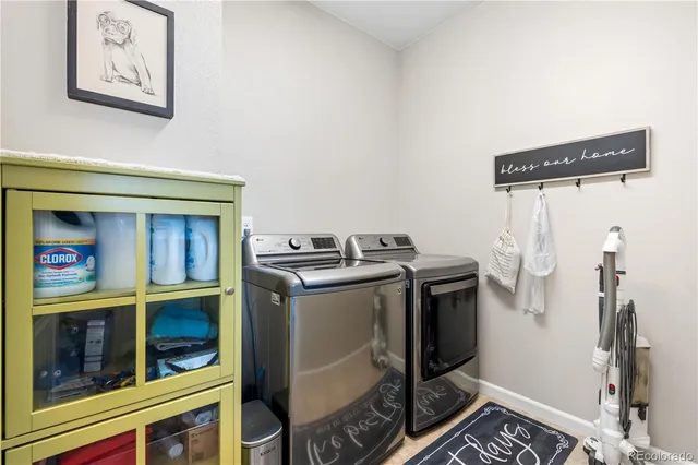 a utility room with dryer and washer