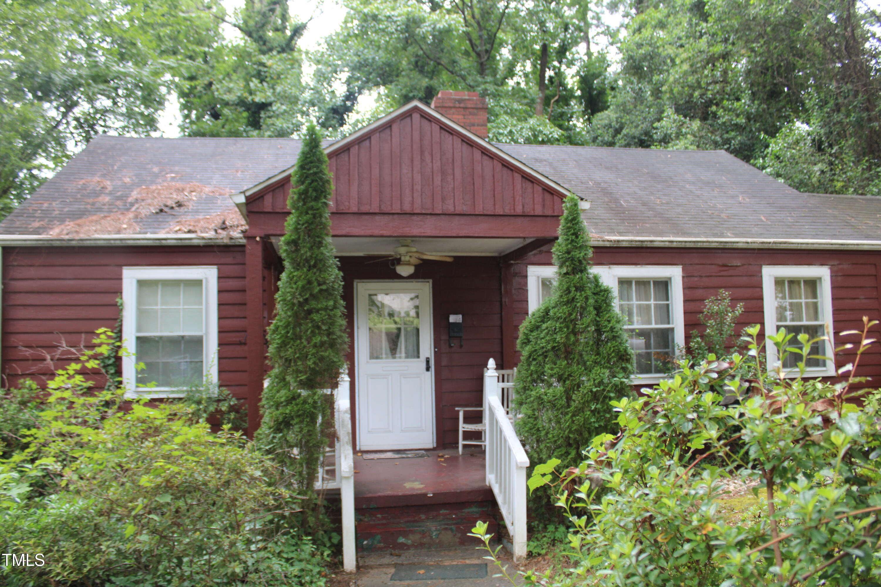 3048 Lewis Farm Road Raleigh, NC 27607 - Photo 5 of 15 a view of a house with brick walls and potted plants