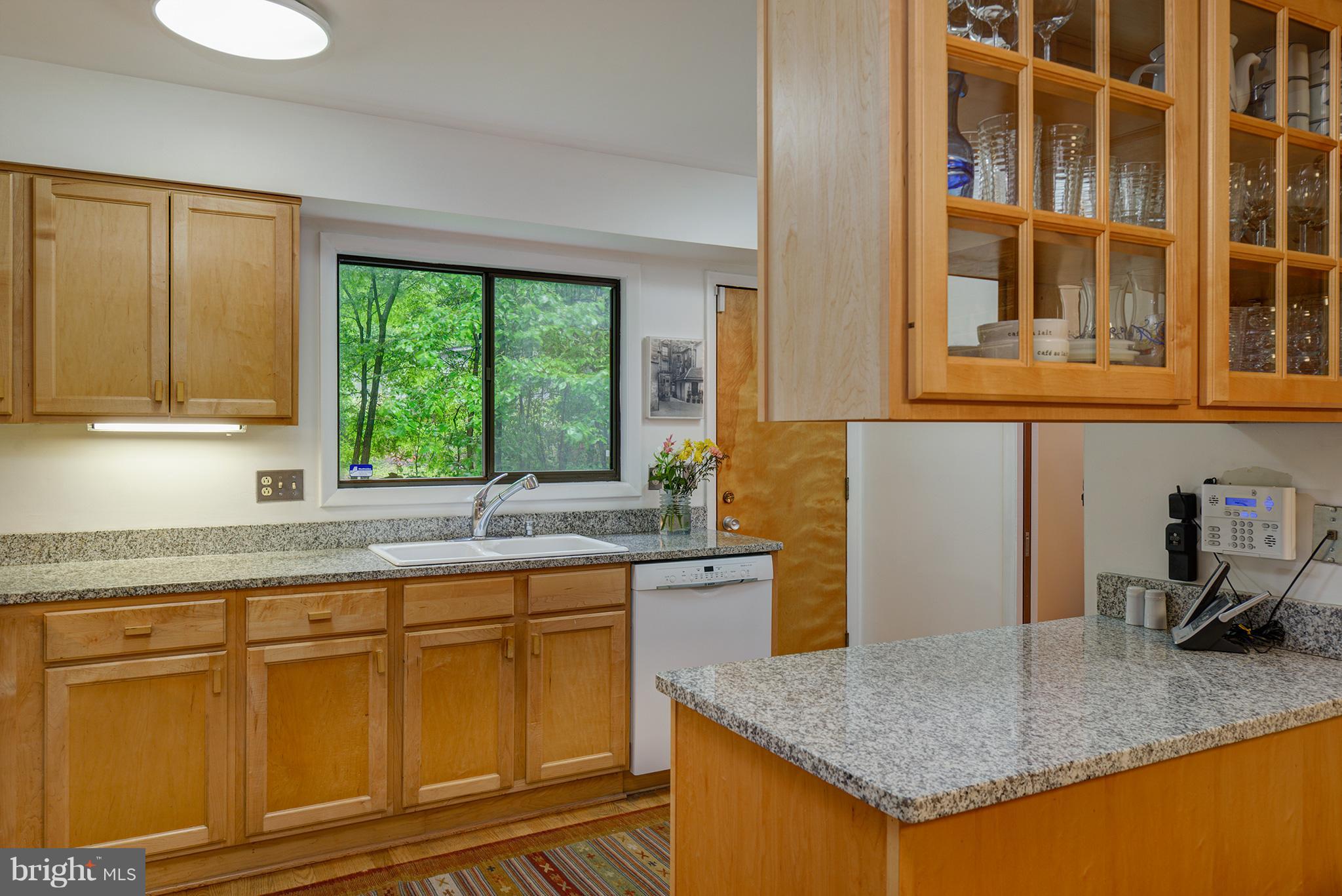12010 Aintree Lane Reston, VA 20191 - Photo 7 of 28 Kitchen with glass doors cabinets!