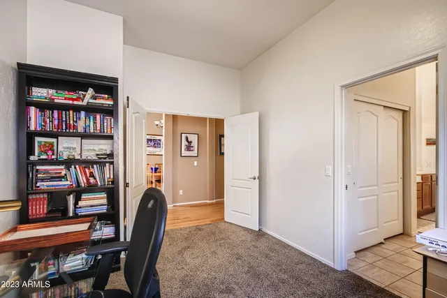 a view of a workspace with furniture