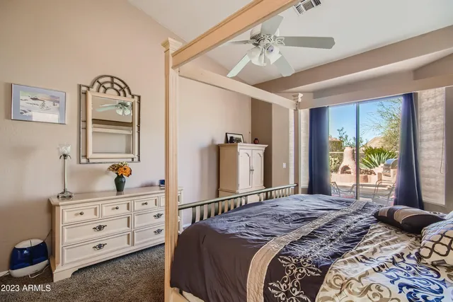 a bathroom with a sink double vanity and a mirror