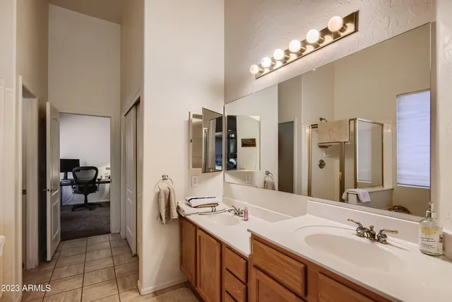 a bathroom with a tub and a shower