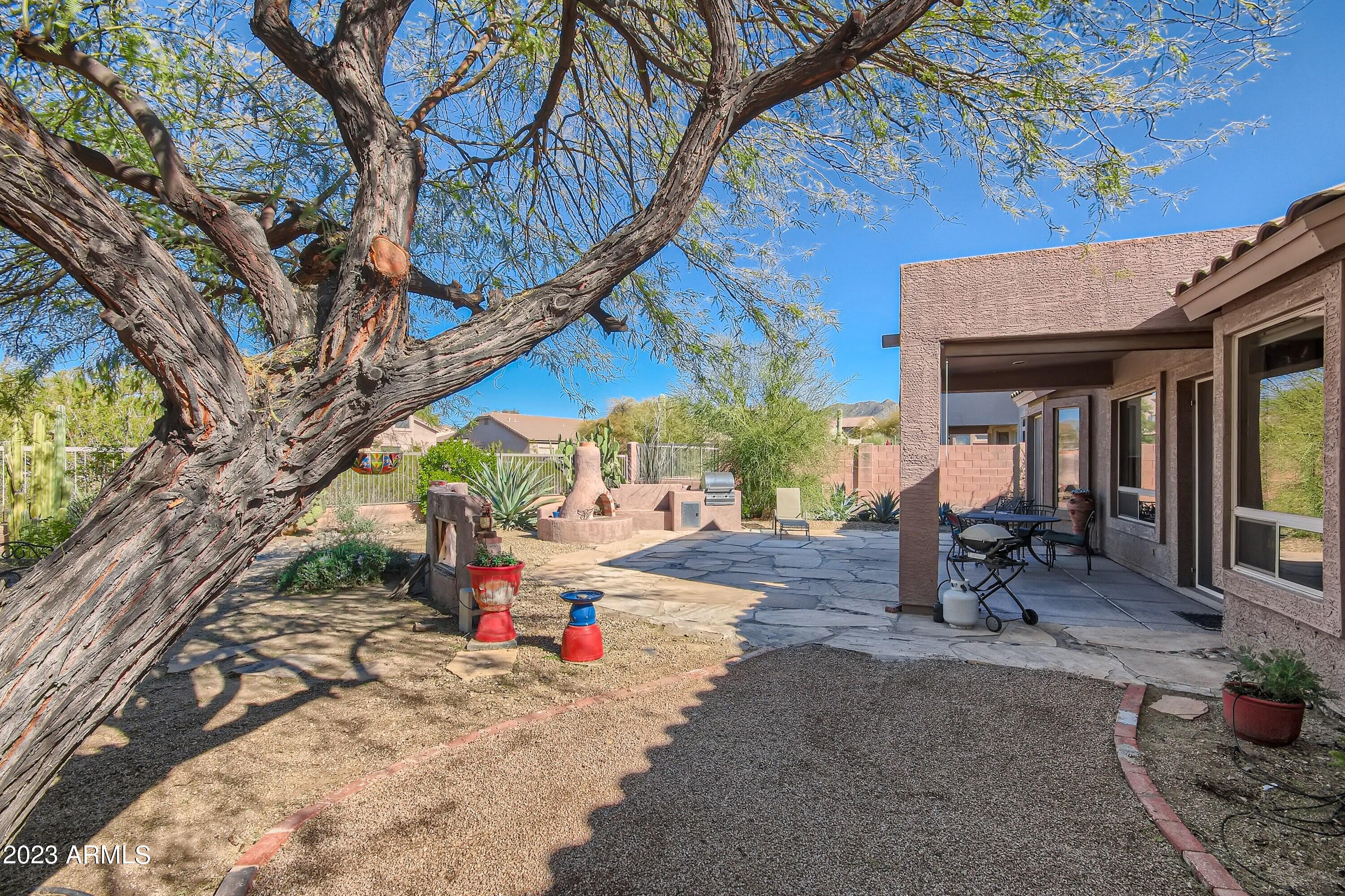 3060 North Ridgecrest, Unit 175 Mesa, AZ 85207 - Photo 26 of 28 a house view with a sitting space