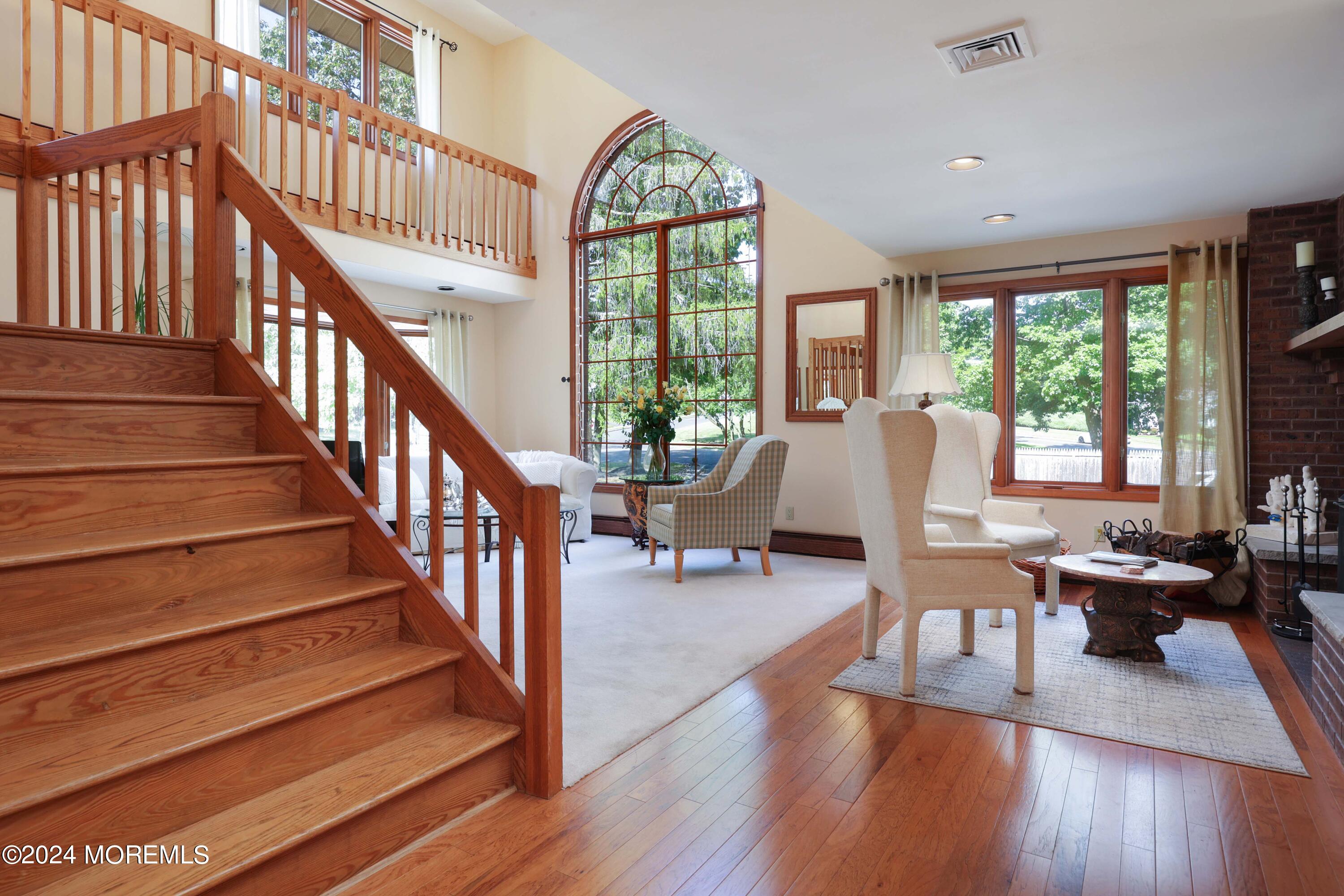 516 Matawan Avenue Keyport, NJ 07735 - Photo 12 of 59 a view of a livingroom with furniture staircase and windows