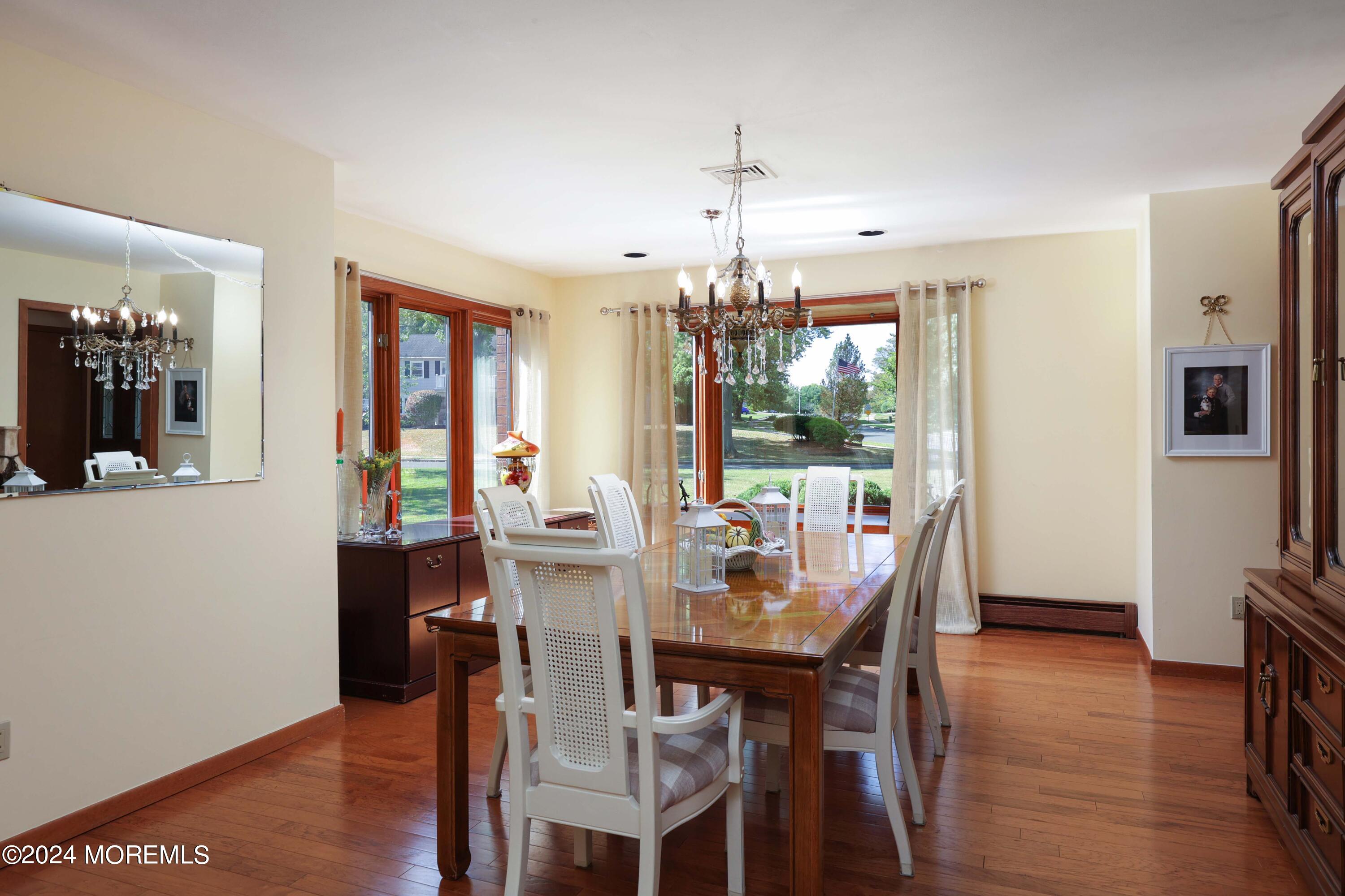 516 Matawan Avenue Keyport, NJ 07735 - Photo 15 of 59 a view of a dining room with furniture window and wooden floor