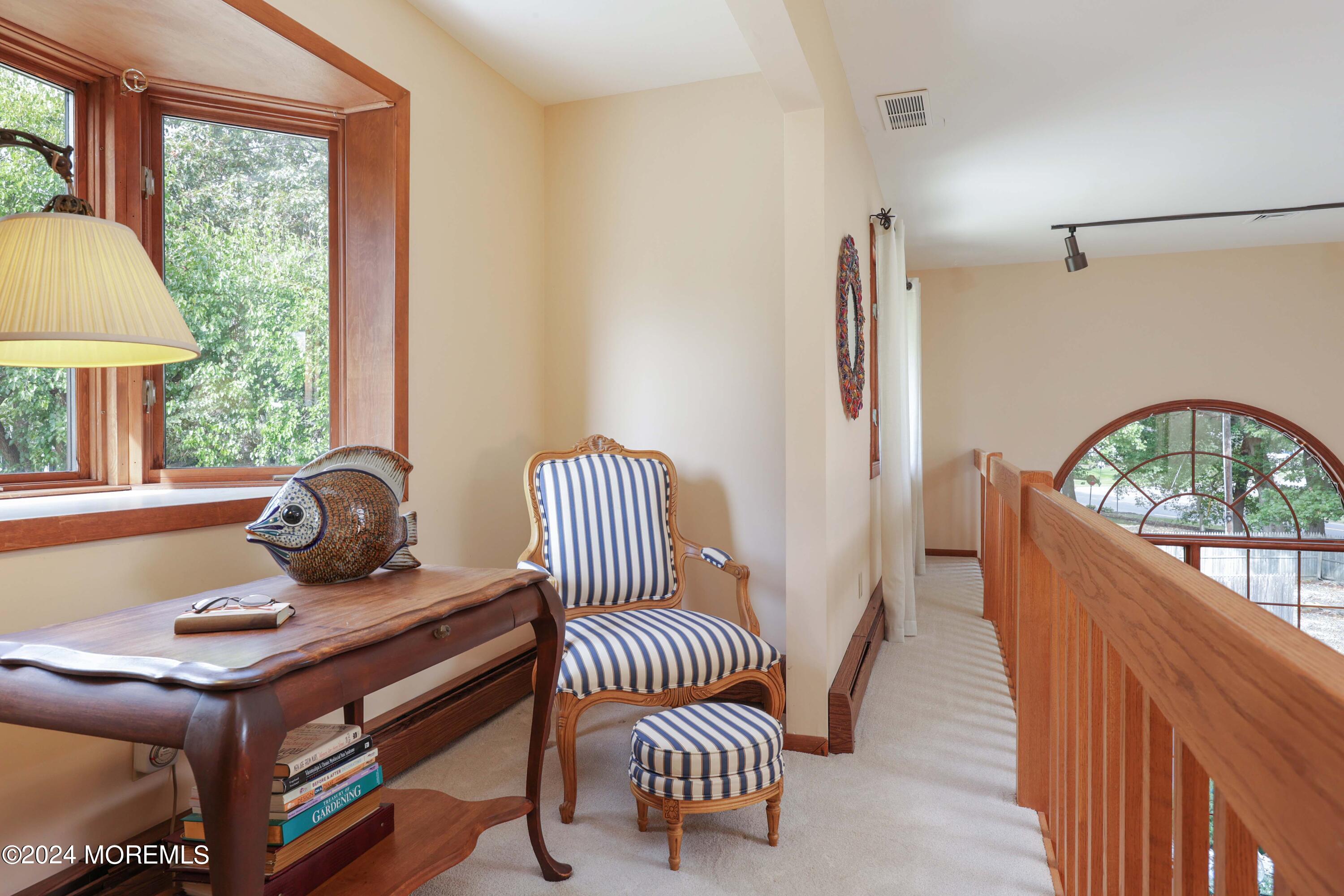 516 Matawan Avenue Keyport, NJ 07735 - Photo 20 of 59 a living room with furniture a table and a large window