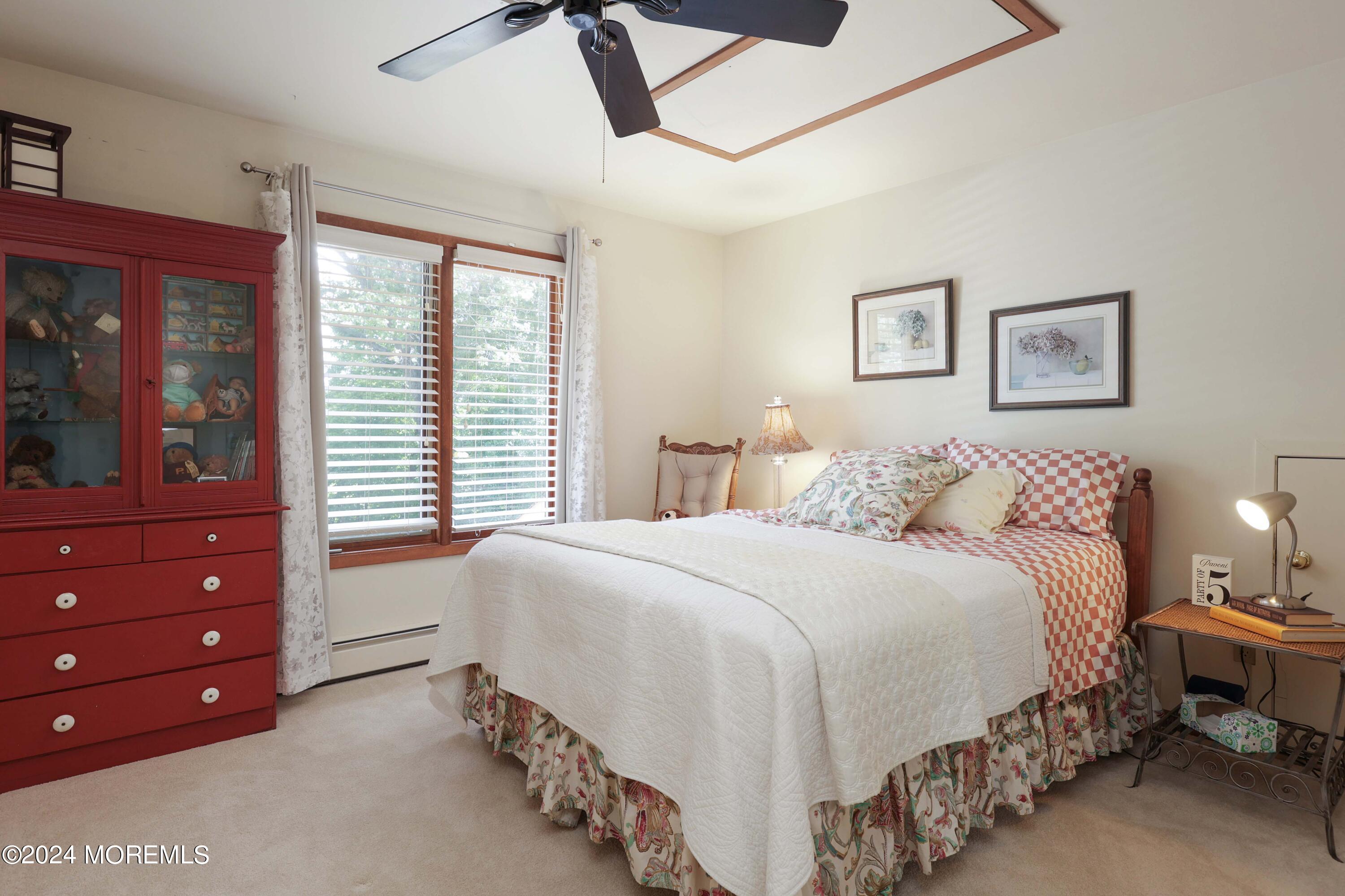 516 Matawan Avenue Keyport, NJ 07735 - Photo 33 of 59 a bedroom with a bed and a window