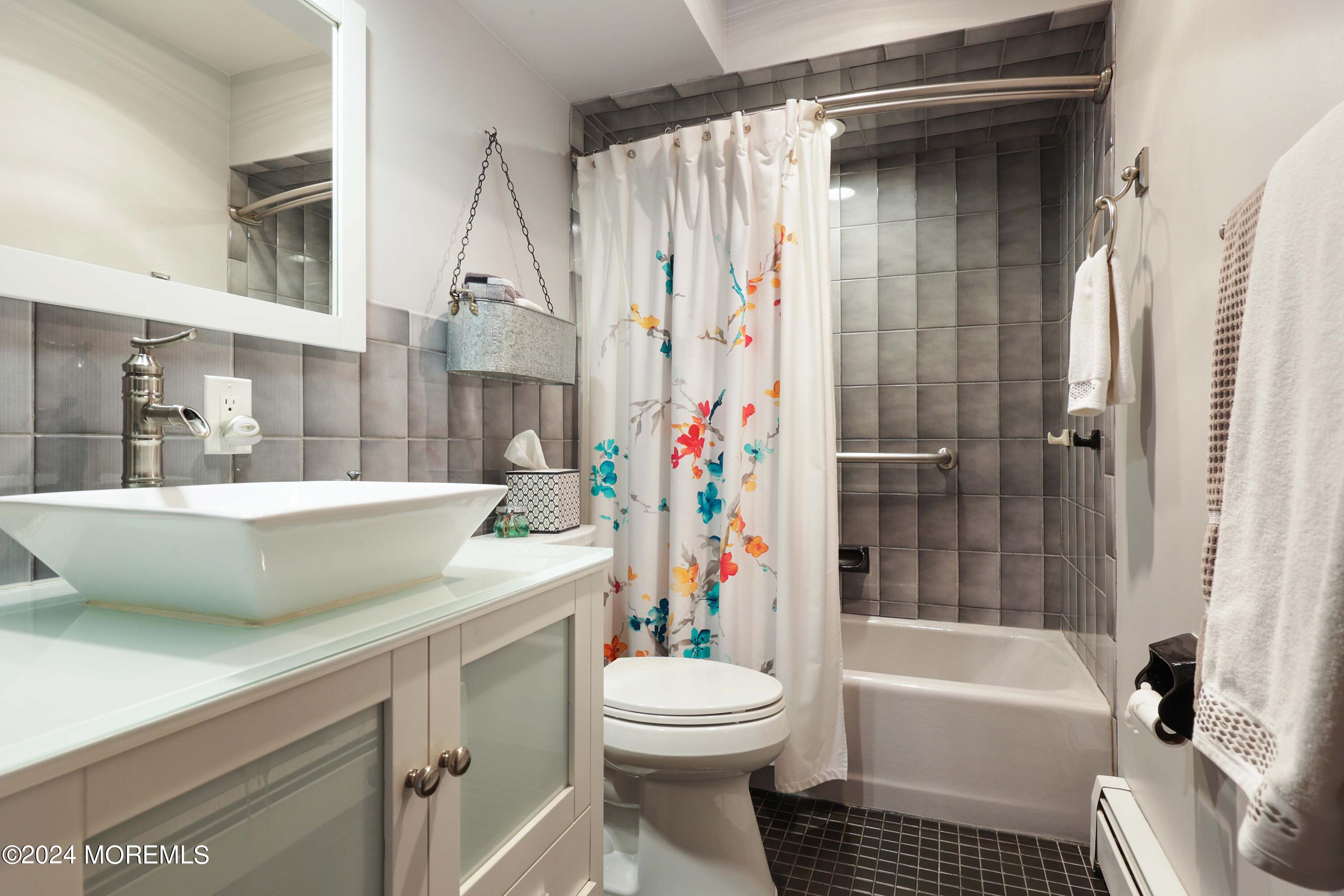 516 Matawan Avenue Keyport, NJ 07735 - Photo 34 of 59 a bathroom with a sink toilet and shower