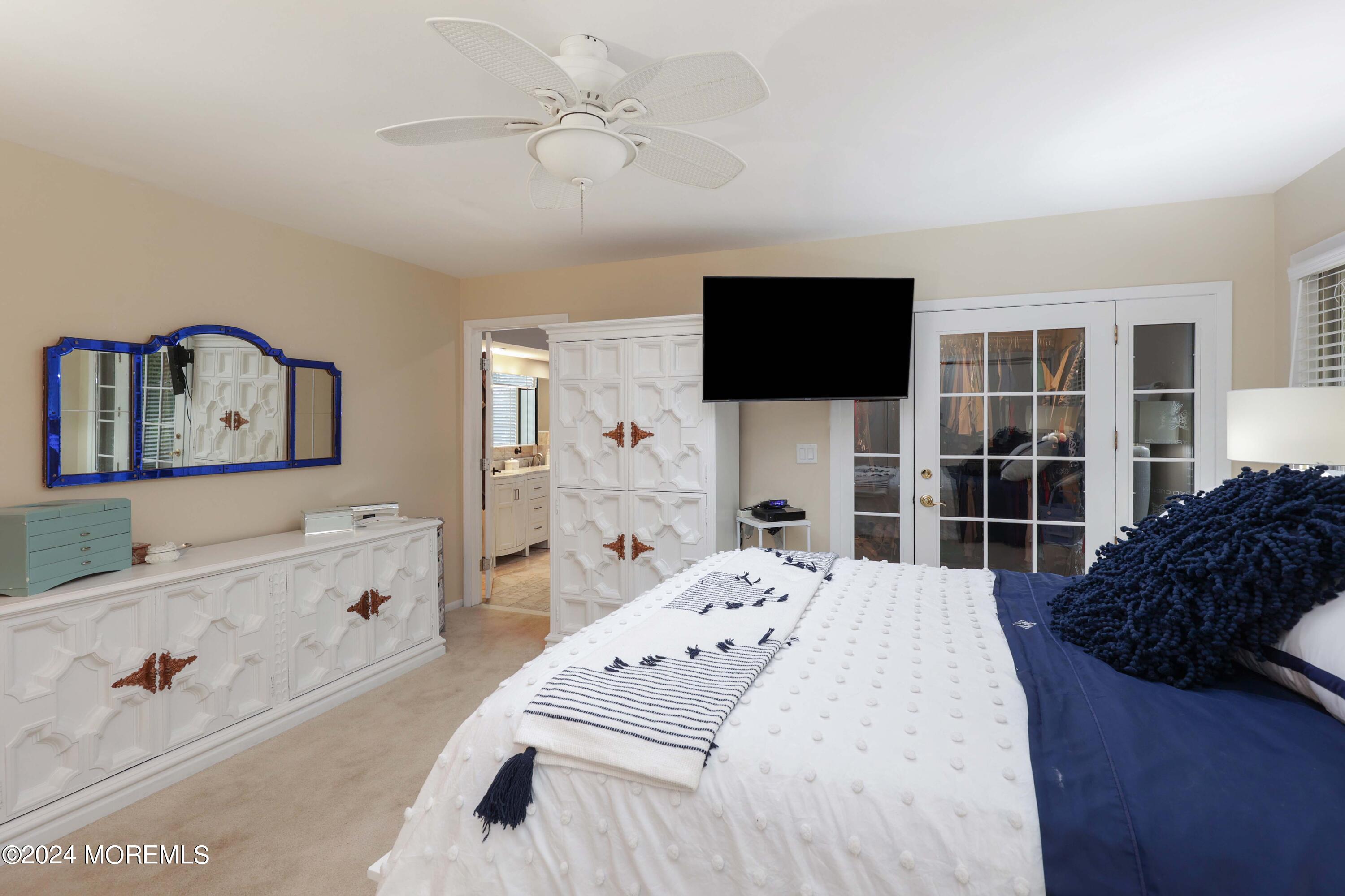 516 Matawan Avenue Keyport, NJ 07735 - Photo 37 of 59 a bedroom with a bed and a flat screen tv