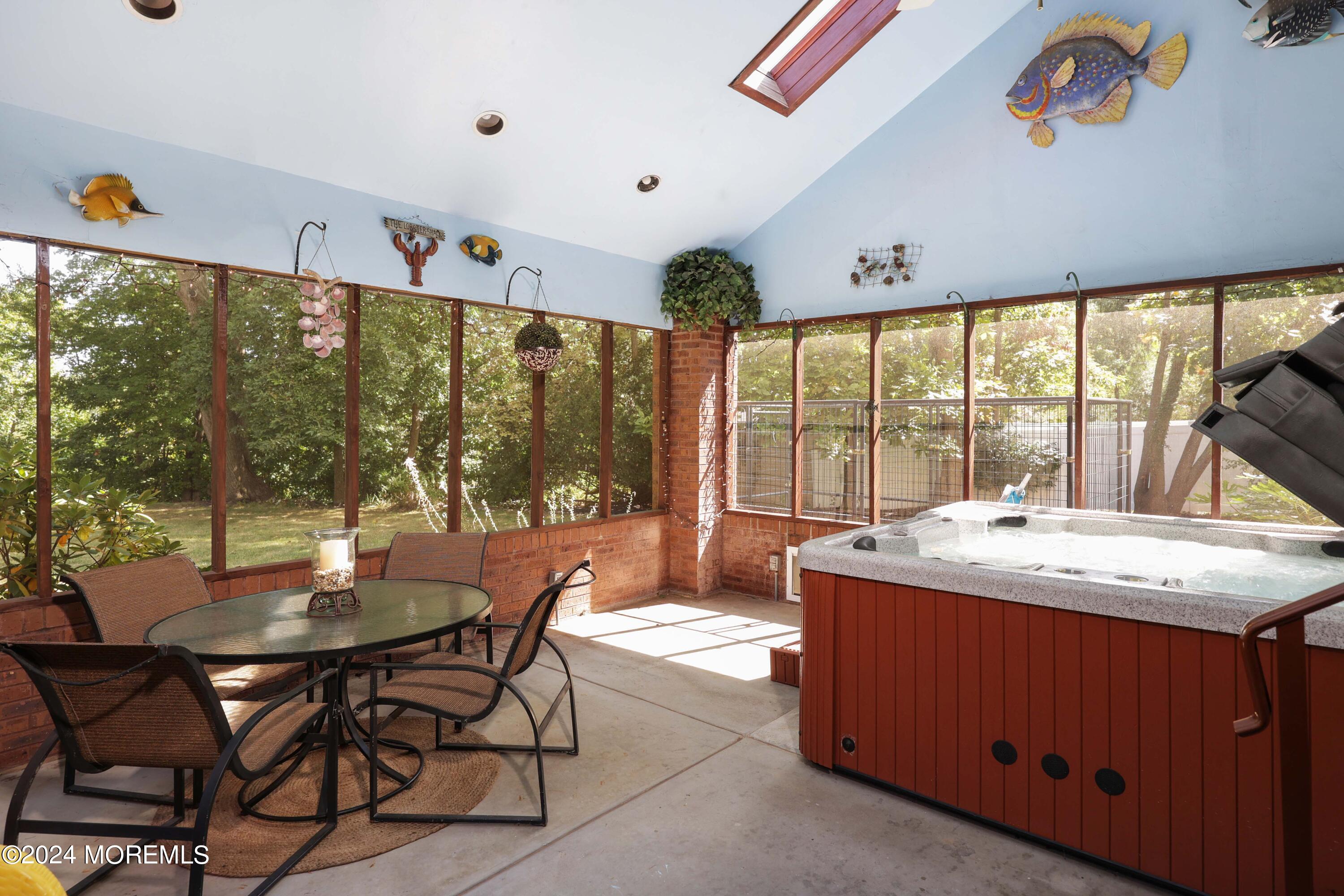 516 Matawan Avenue Keyport, NJ 07735 - Photo 41 of 59 a dining hall with a large window and dining table