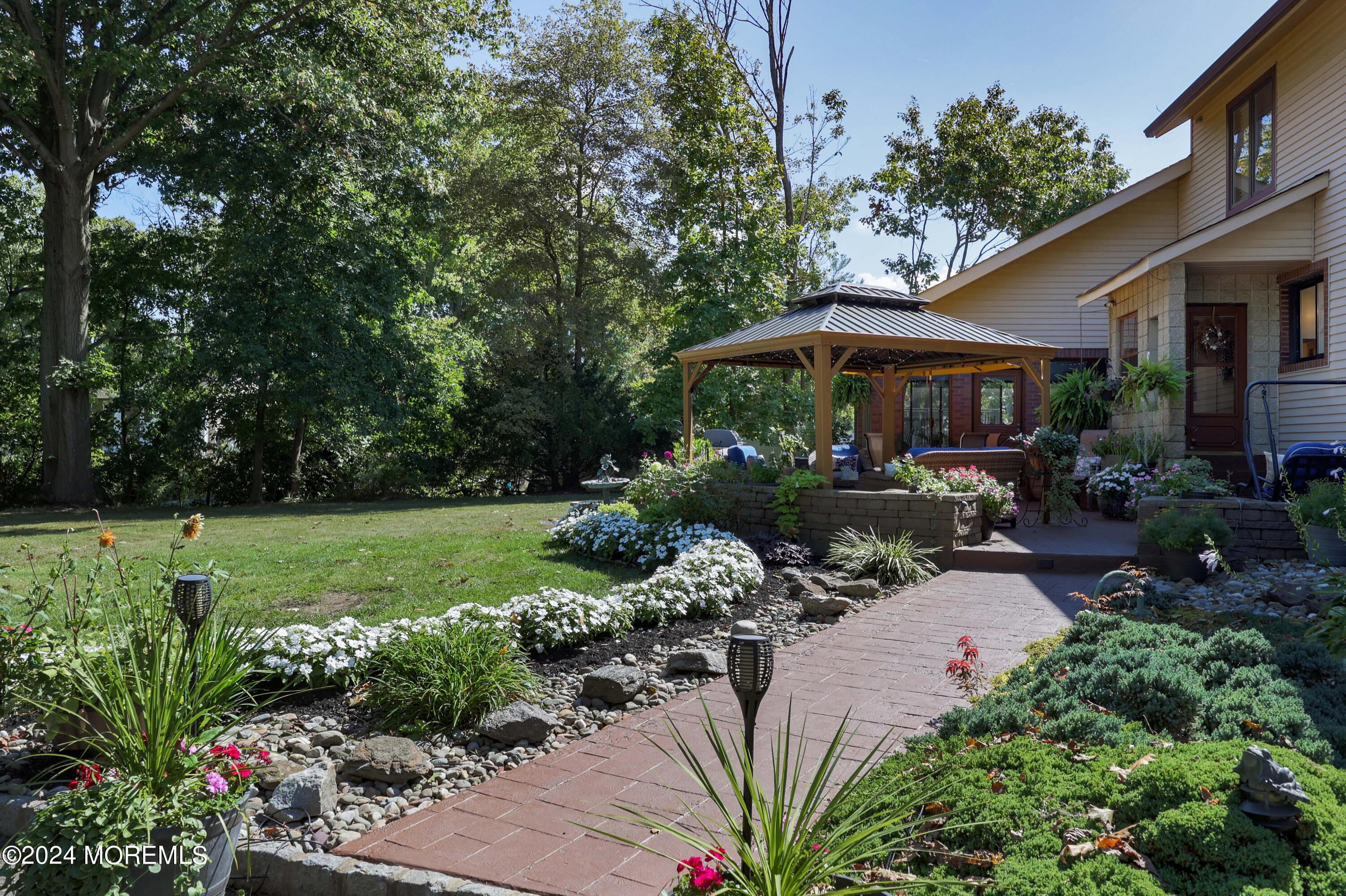 516 Matawan Avenue Keyport, NJ 07735 - Photo 45 of 59 a view of a garden with patio