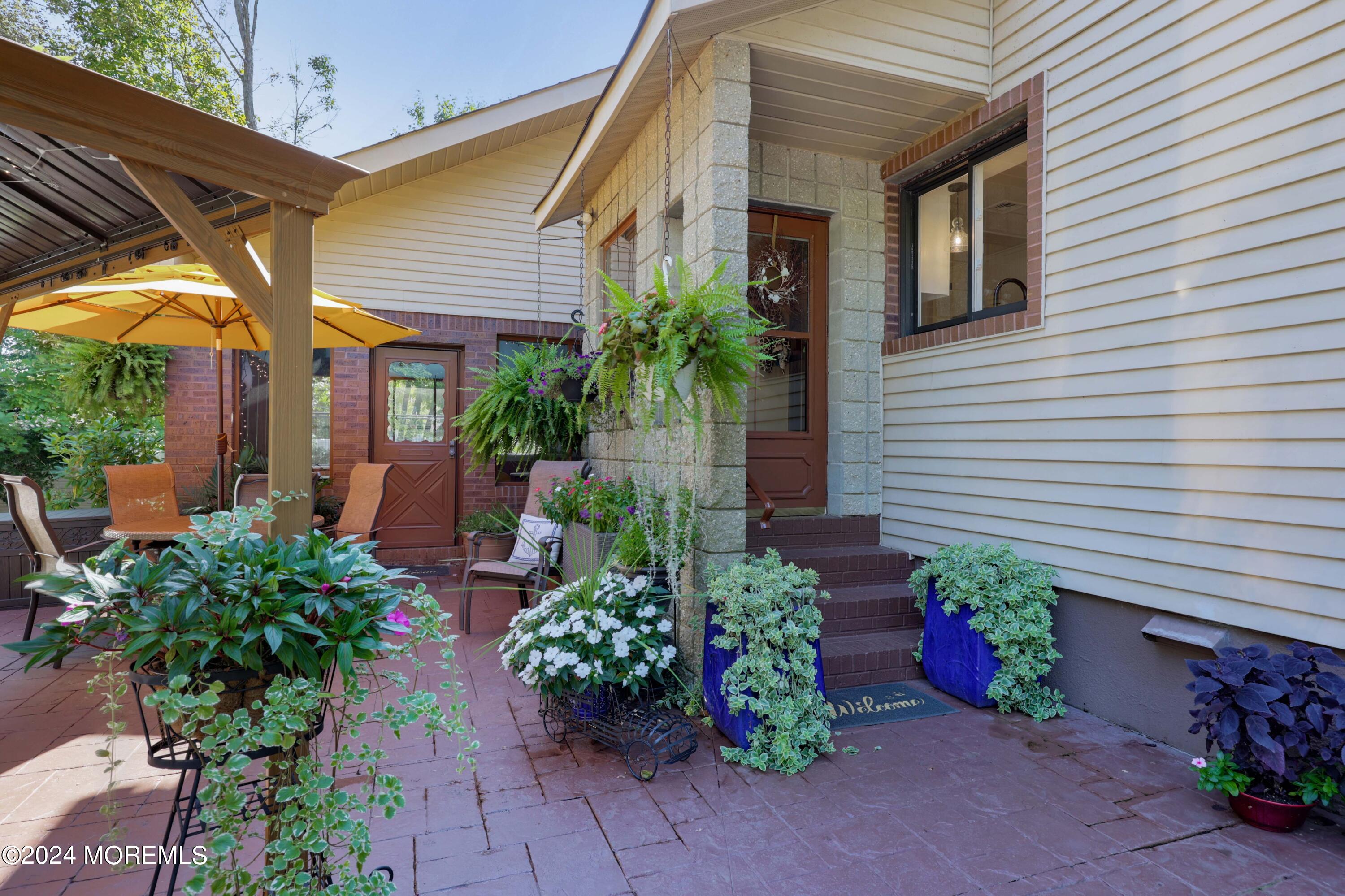516 Matawan Avenue Keyport, NJ 07735 - Photo 46 of 59 a front view of a house with plants