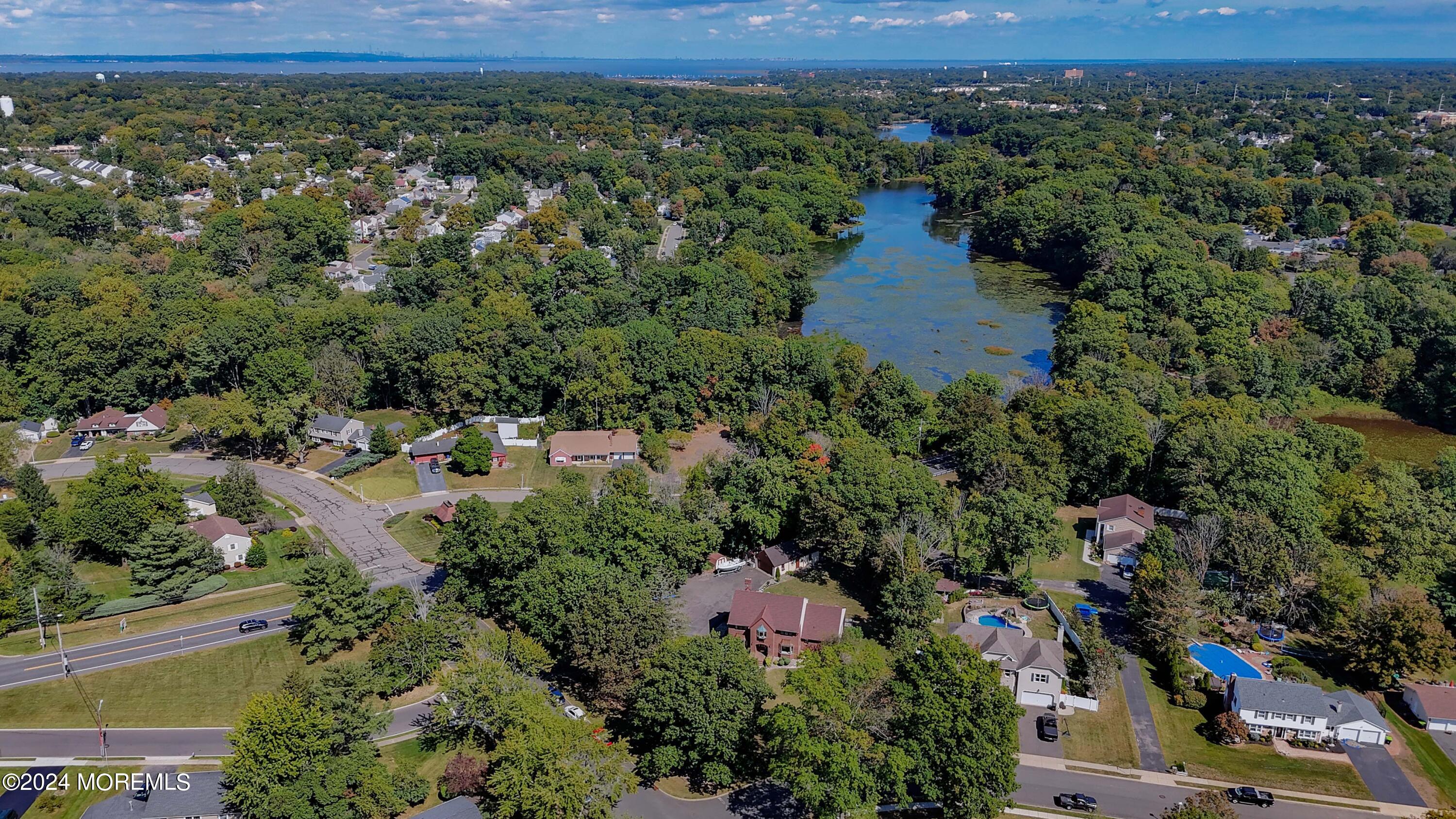 516 Matawan Avenue Keyport, NJ 07735 - Photo 50 of 59 an aerial view of a house with a yard and lake view