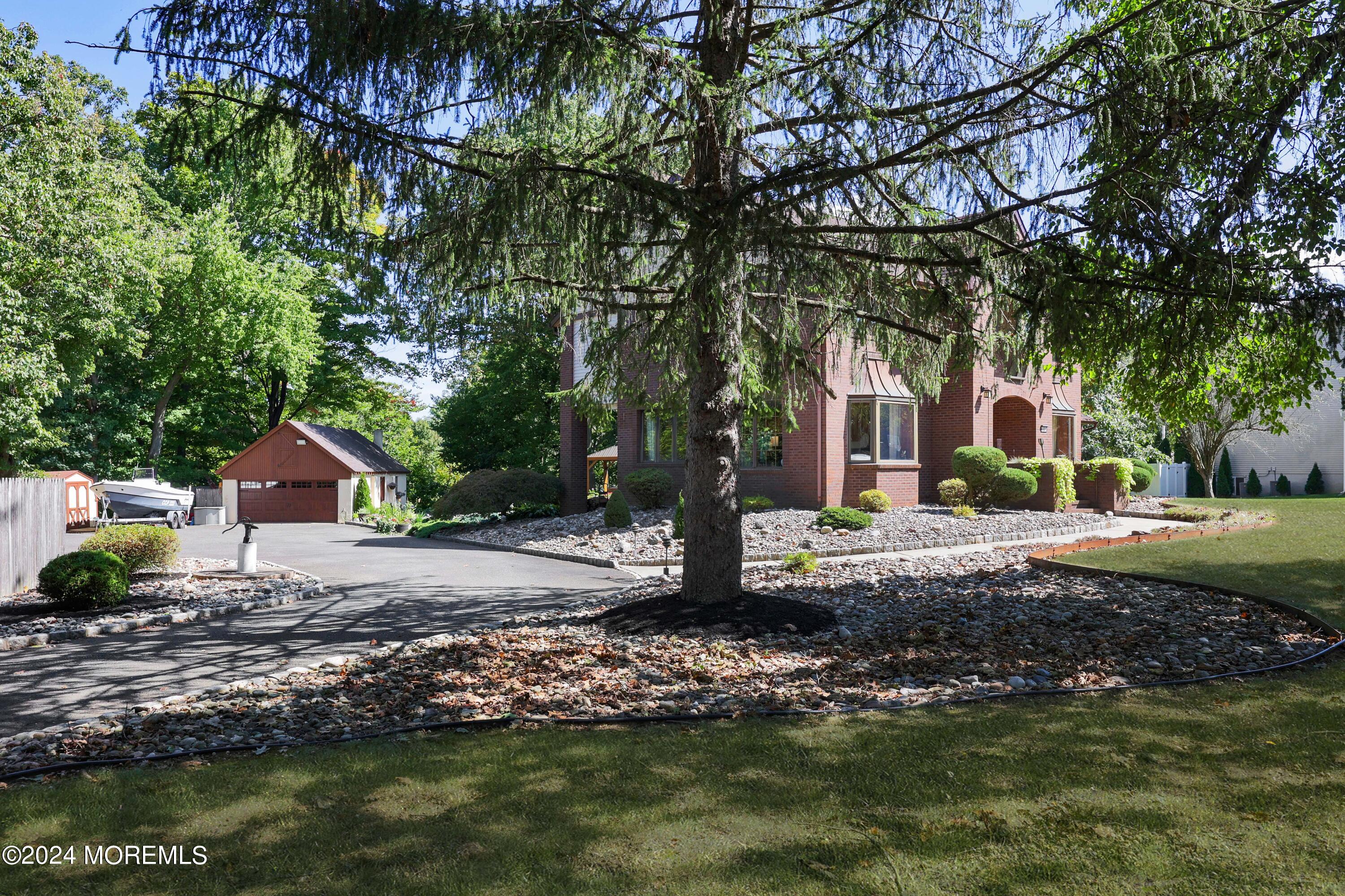 516 Matawan Avenue Keyport, NJ 07735 - Photo 6 of 59 a front view of a house with a yard