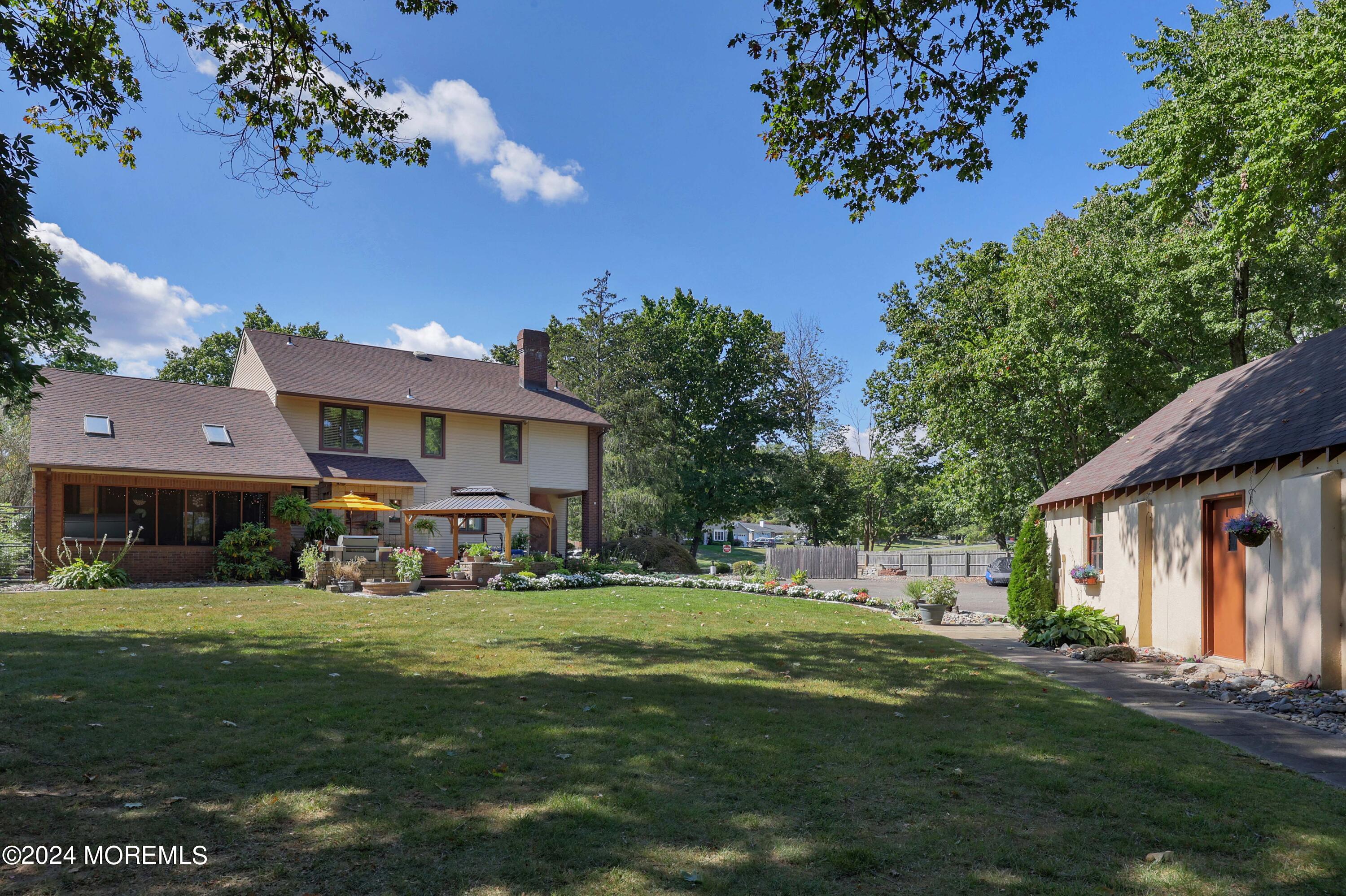 516 Matawan Avenue Keyport, NJ 07735 - Photo 8 of 59 a front view of a house with garden