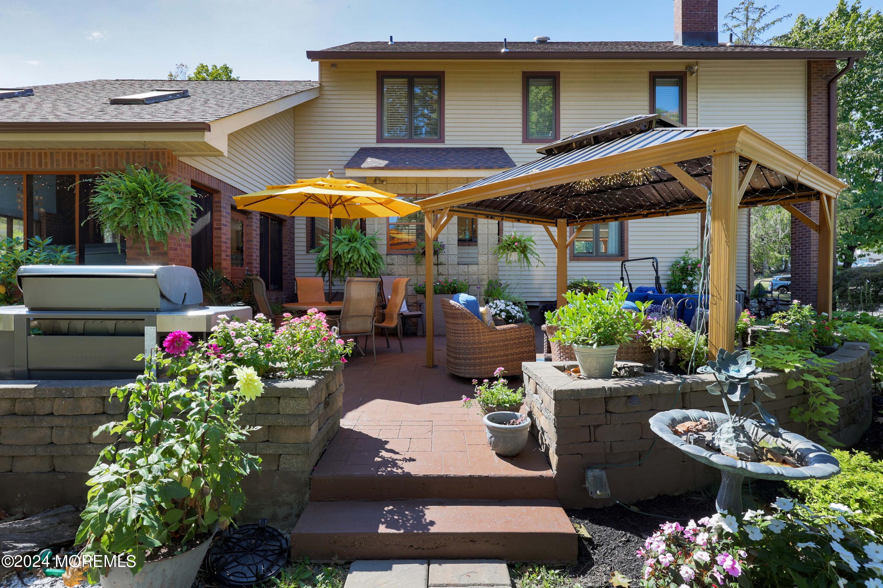 516 Matawan Avenue Keyport, NJ 07735 - Photo 9 of 59 a view of a chairs and table in a patio