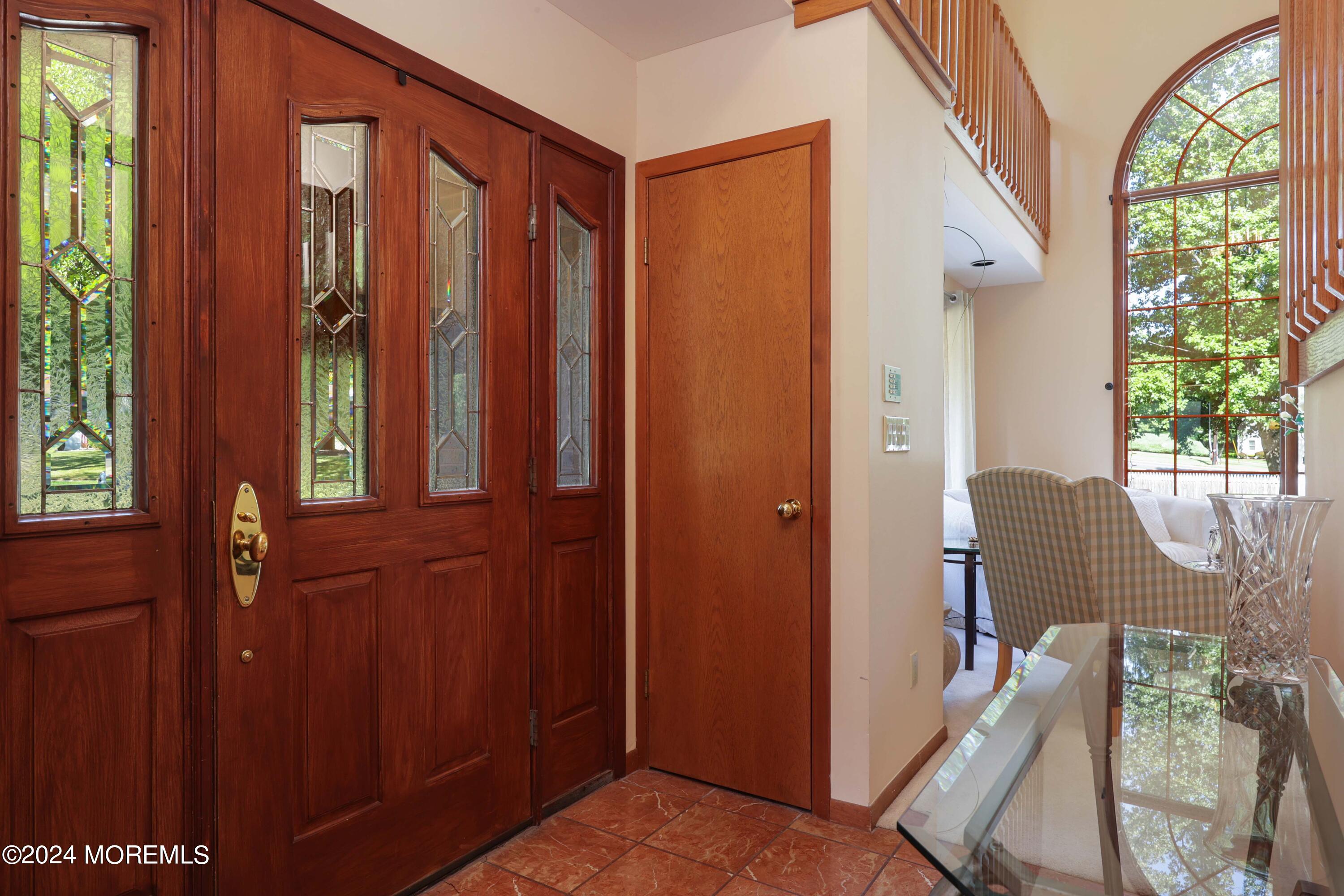 516 Matawan Avenue Keyport, NJ 07735 - Photo 10 of 59 a view of an entryway with furniture and a window