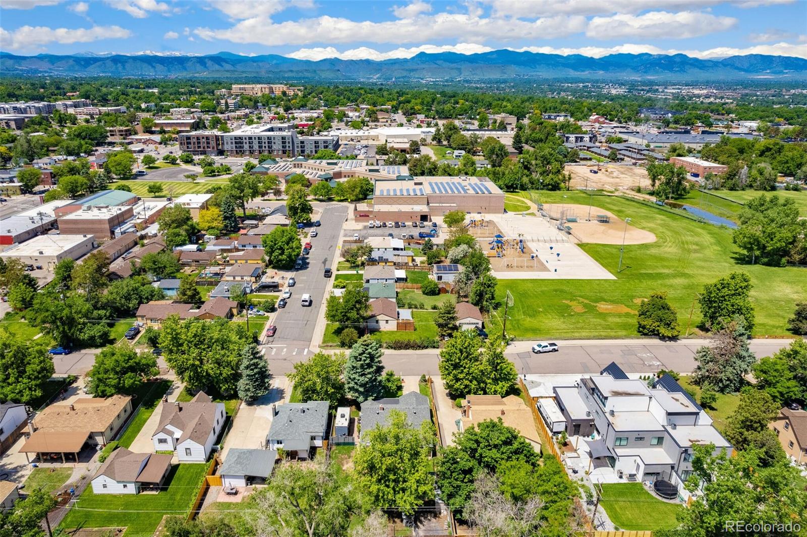 3880 Reed Street Wheat Ridge, CO 80033 - Photo 3 of 40 an aerial view of residential houses with outdoor space
