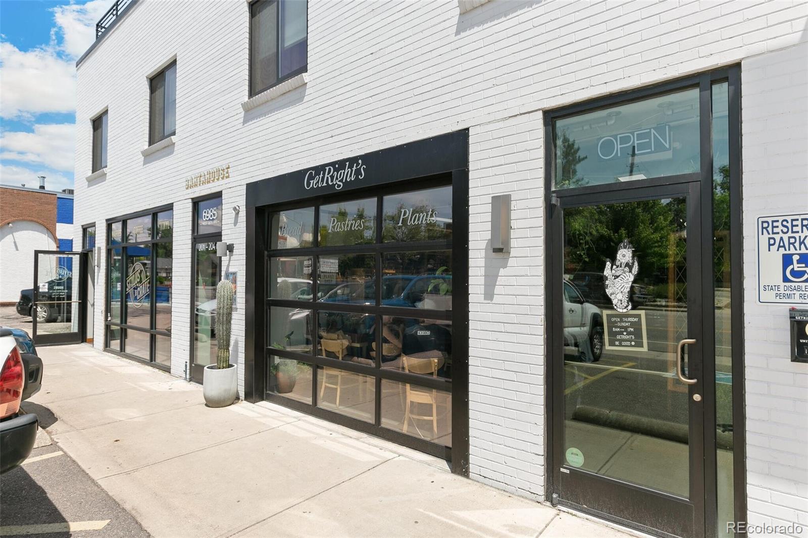 3880 Reed Street Wheat Ridge, CO 80033 - Photo 38 of 40 a view of a entryway front of the building