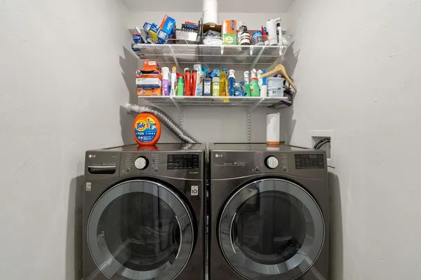 a utility room with dryer and washer