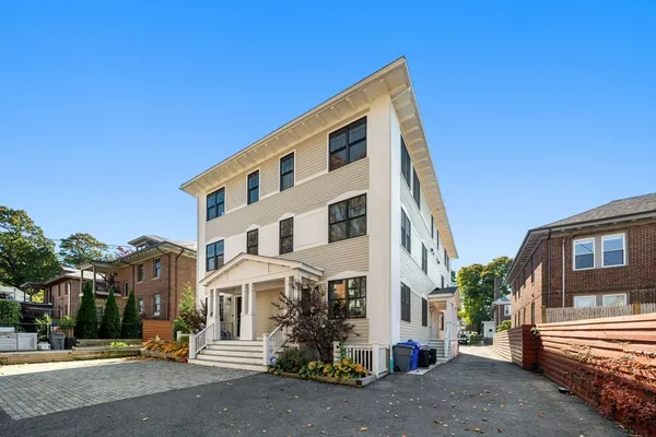 a view of a building with a street