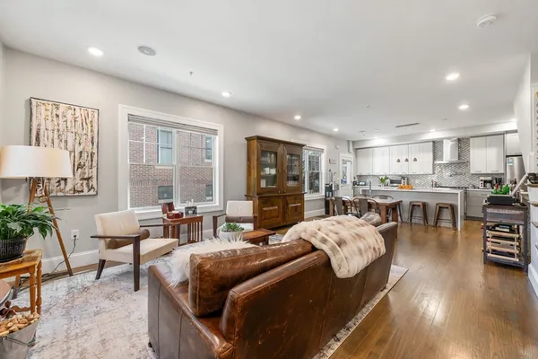 a living room with furniture and a table