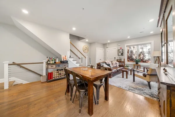 a room with lots of furniture and a table