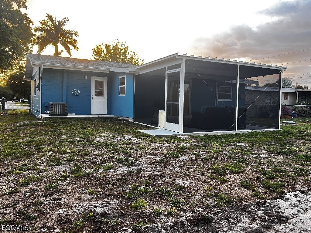 144 Whidden Road North Fort Myers, FL 33917 - Photo 2 of 16 a view of a house with a yard