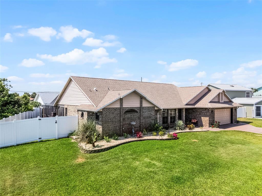 front view of a house with a yard