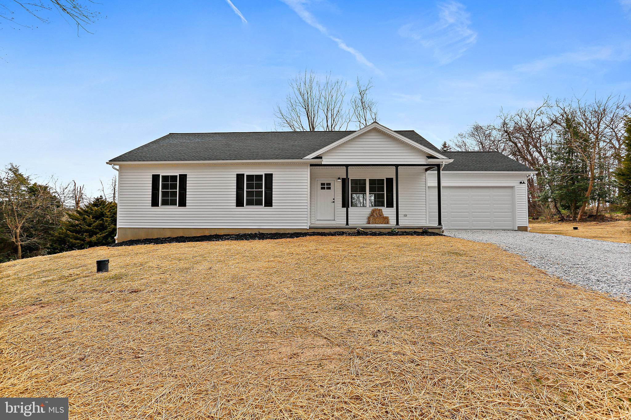 23 Juniper Road Delta, PA 17314 - Photo 1 of 33 a front view of a house with a yard