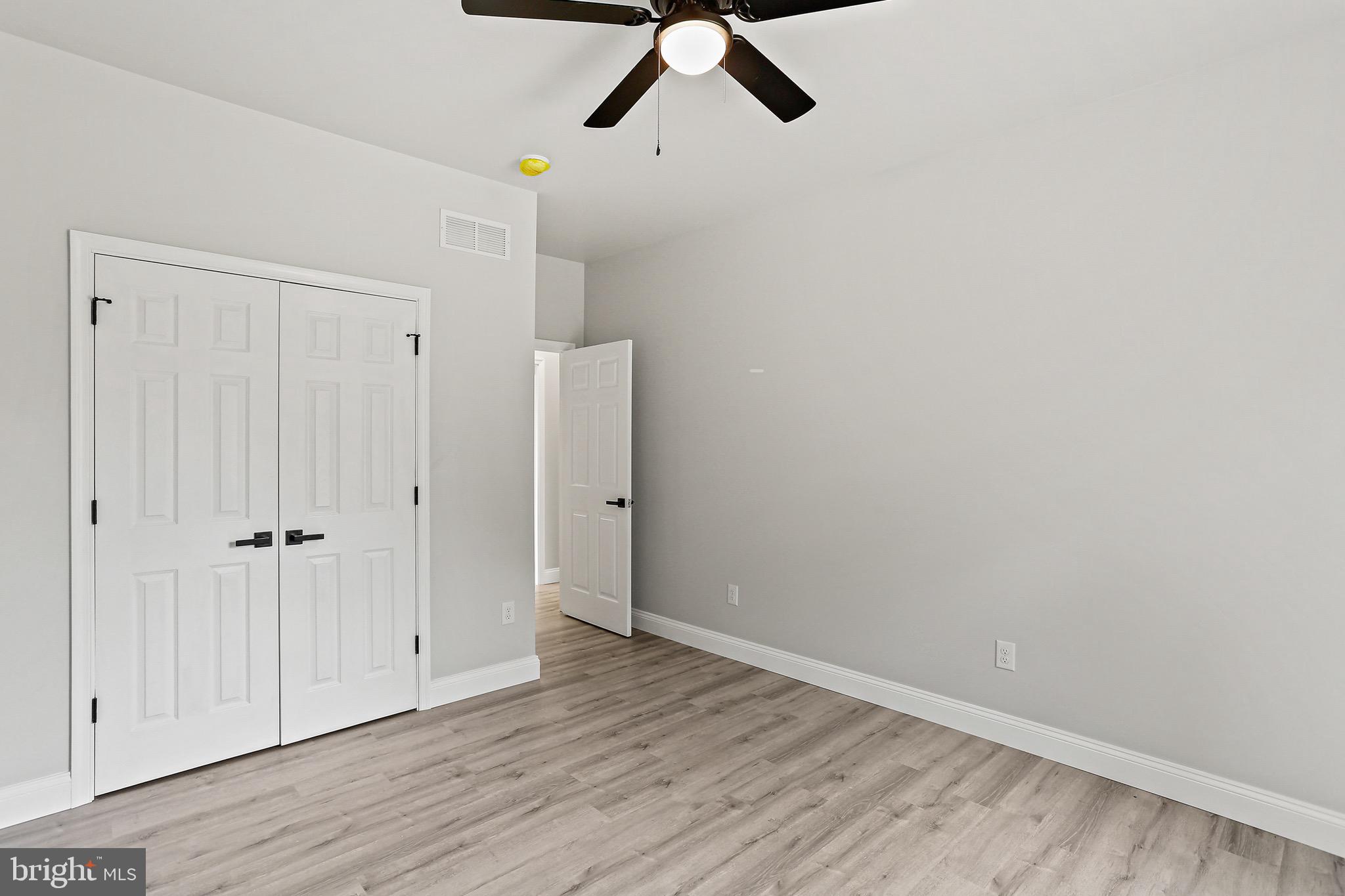 23 Juniper Road Delta, PA 17314 - Photo 12 of 33 a view of empty room with wooden floor