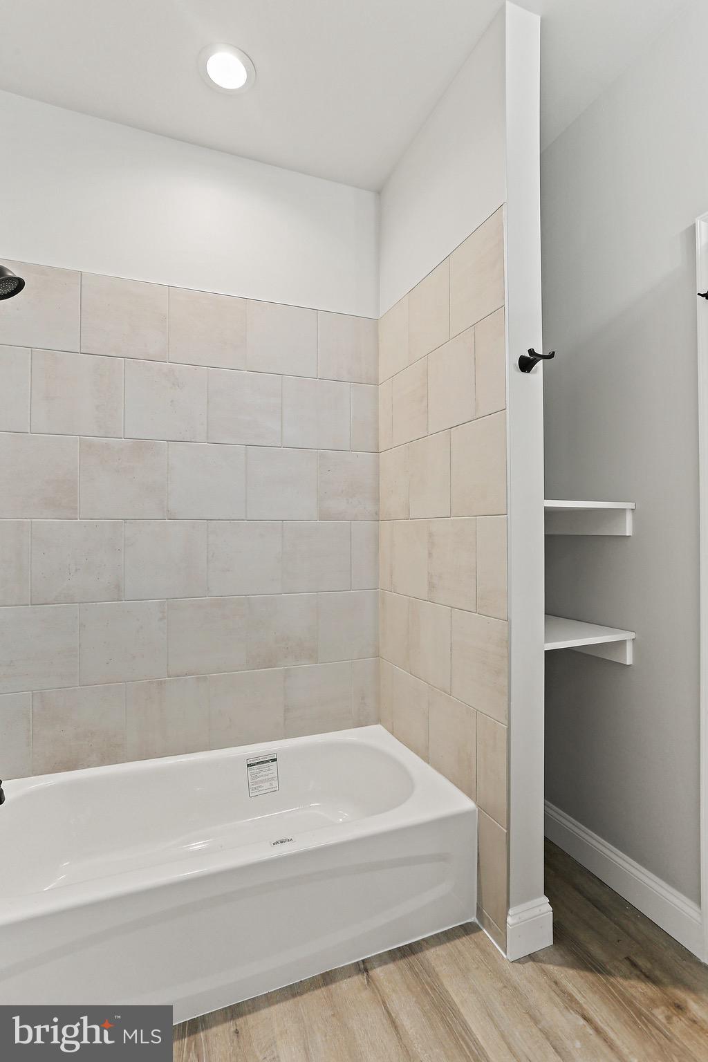 23 Juniper Road Delta, PA 17314 - Photo 17 of 33 a bathroom with a bathtub and a shower