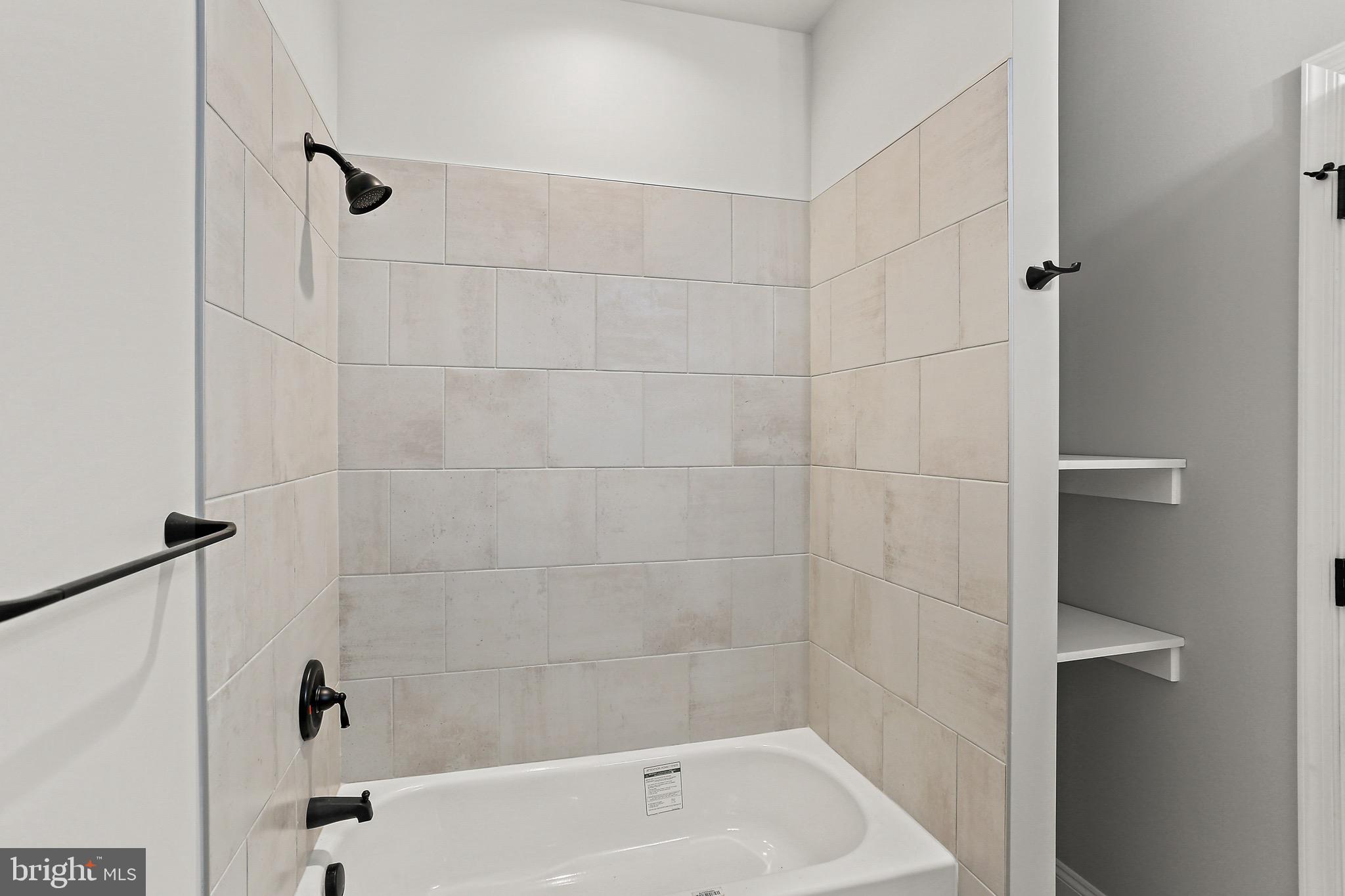 23 Juniper Road Delta, PA 17314 - Photo 18 of 33 a bathroom with a bathtub