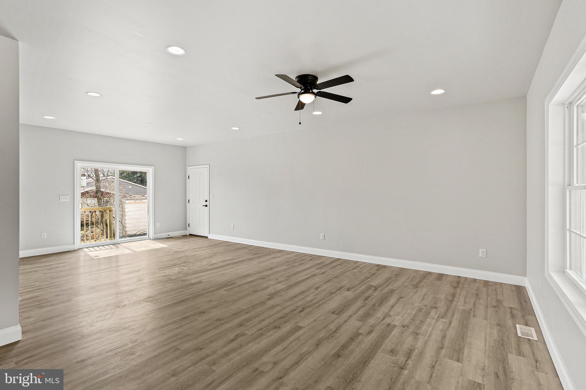 23 Juniper Road Delta, PA 17314 - Photo 19 of 33 wooden floor in an empty room with a window