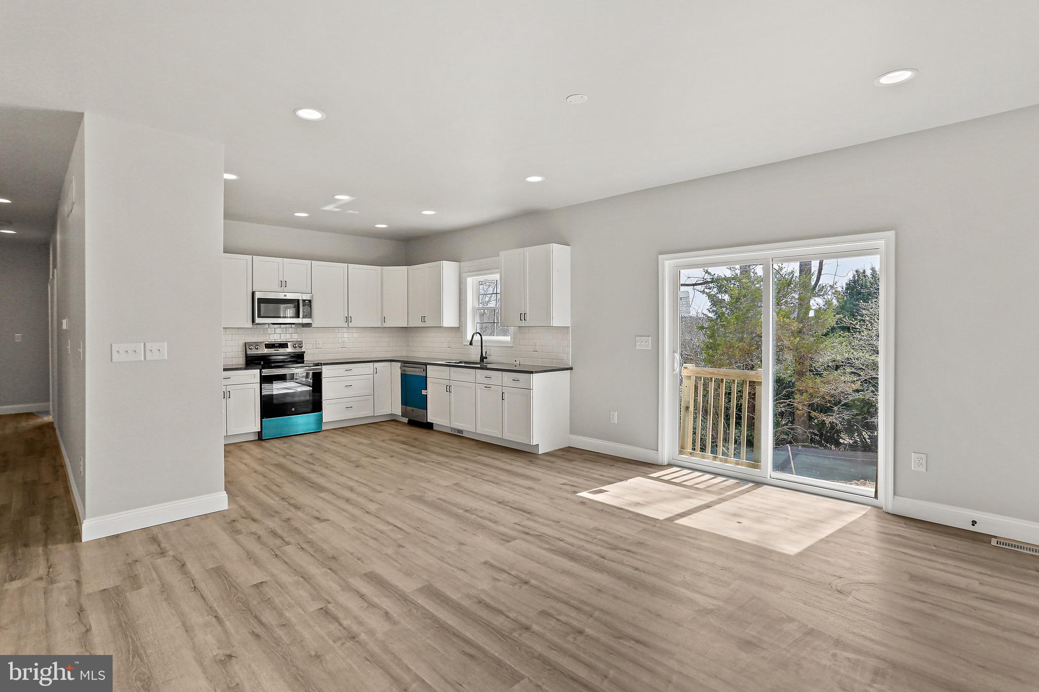 23 Juniper Road Delta, PA 17314 - Photo 22 of 33 a view of a kitchen with wooden floor and windows