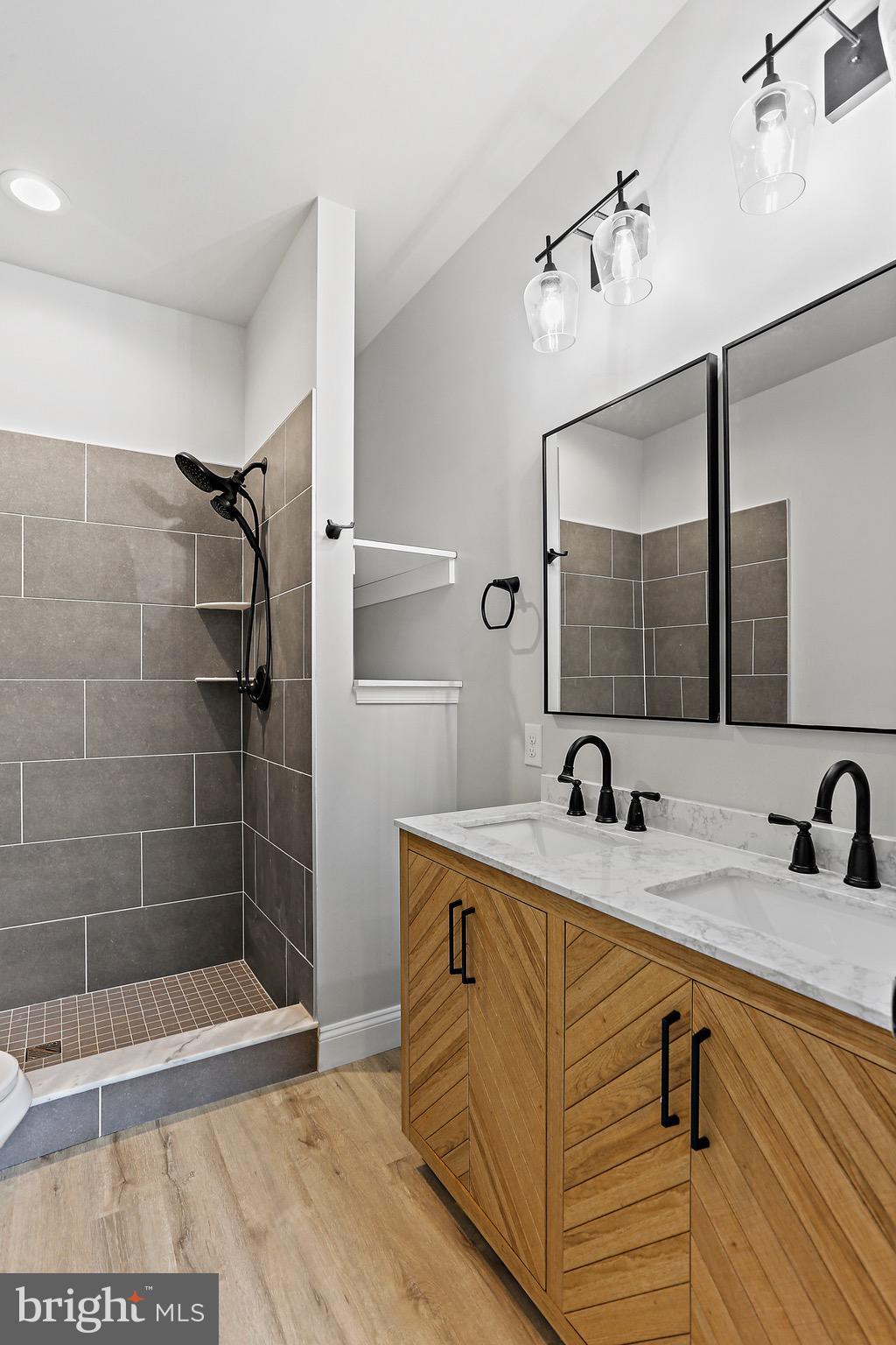 23 Juniper Road Delta, PA 17314 - Photo 10 of 33 a bathroom with a sink and a mirror