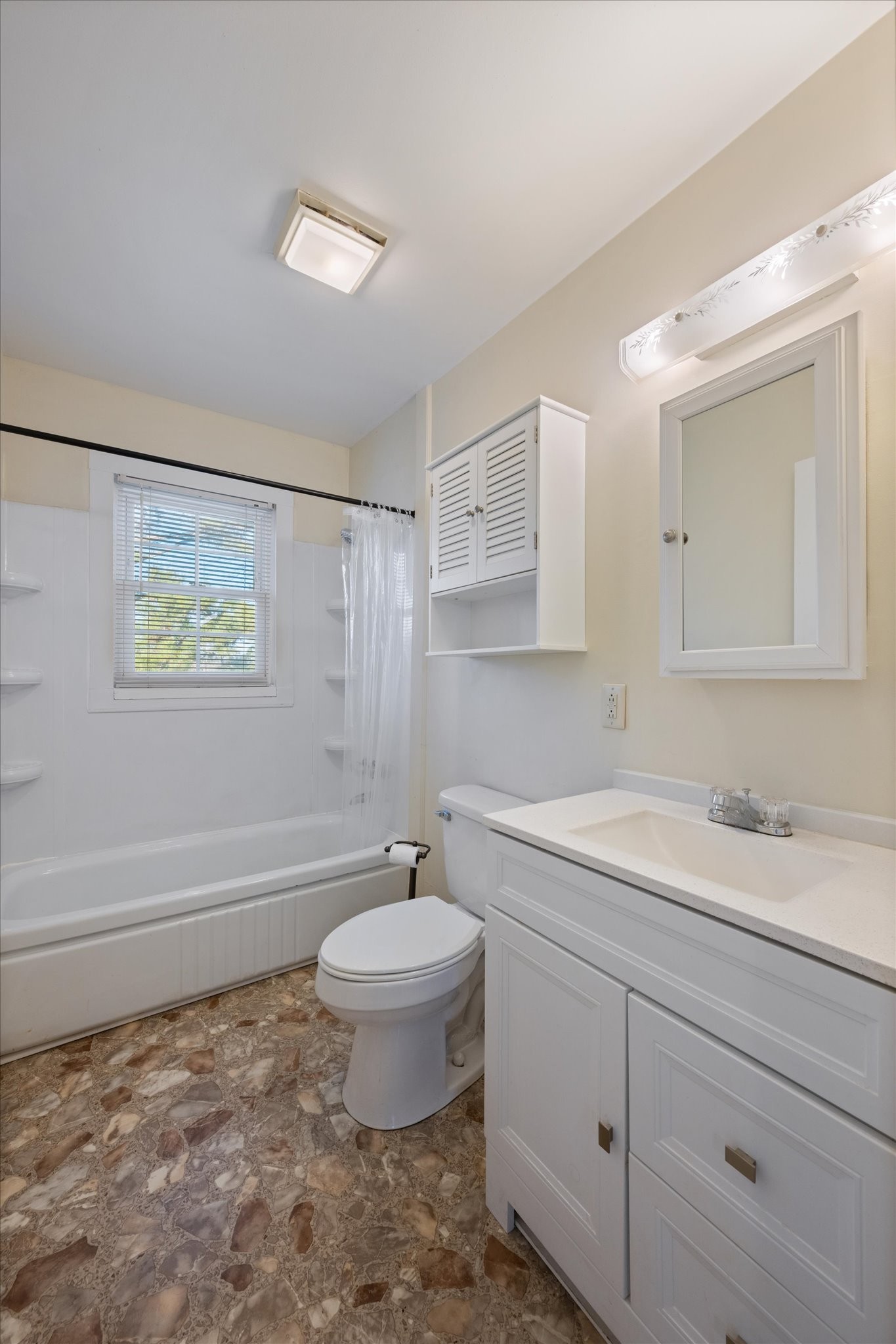 105 Arnold Street Centerville, TN 37033 - Photo 15 of 15 a bathroom with a sink toilet a mirror and bathtub