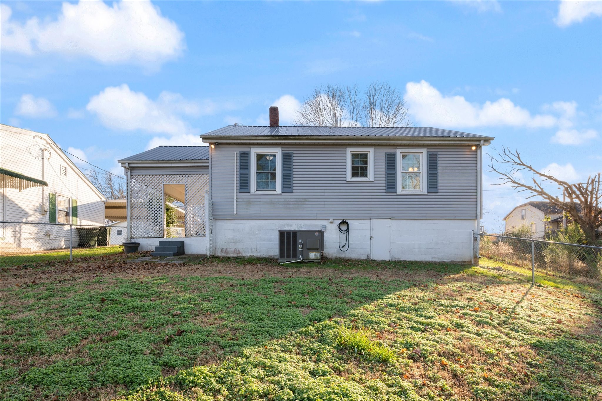105 Arnold Street Centerville, TN 37033 - Photo 4 of 15 a view of a house with a yard