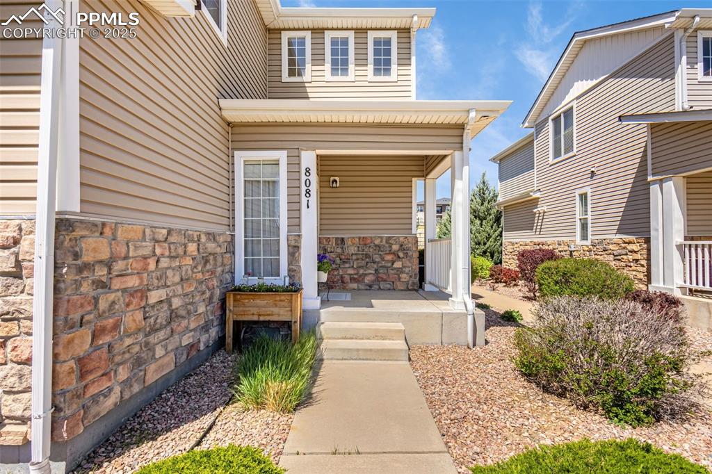 a front view of a house with a porch